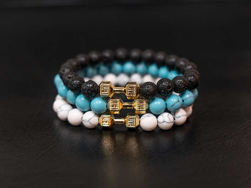 Bracelet With Gold Dumbbell.